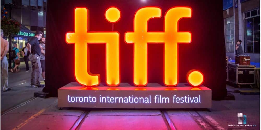 Brightly lit TIFF sign in Toronto, highlighting the city's reputation as a major film production