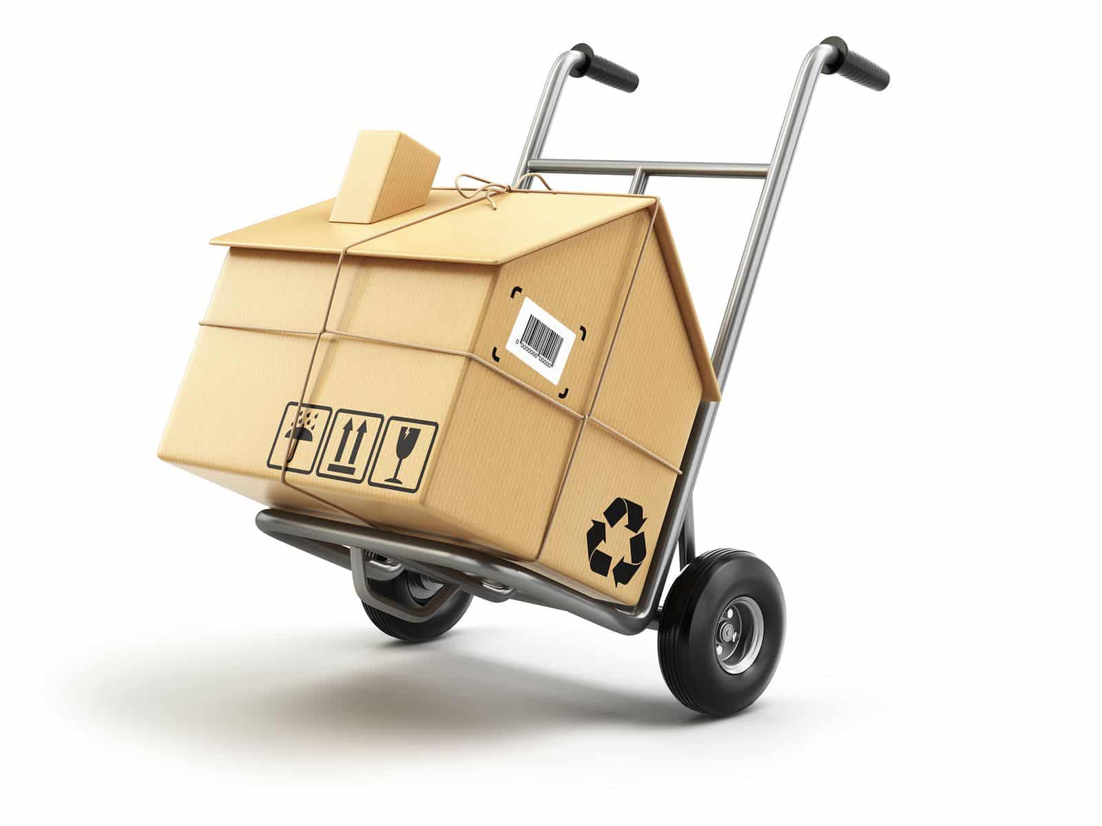 Cardboard boxes representing real estate investments on a hand truck, illustrating the changing Toronto condo