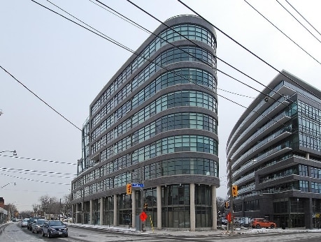 Modern loft building at 1201 Dundas Street, a featured property in Toronto's East End, showcasing