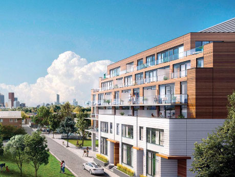 Modern condo building exterior in Toronto’s East End, showcasing balconies and a vibrant neighborhood, featured
