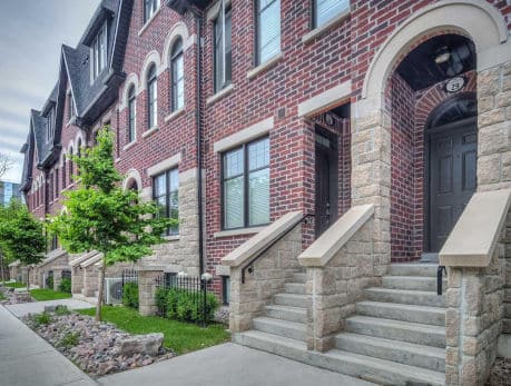 Attractive brick townhouses in Toronto’s East End, showcasing Riverside Towns at 150 Broadview Ave, offering