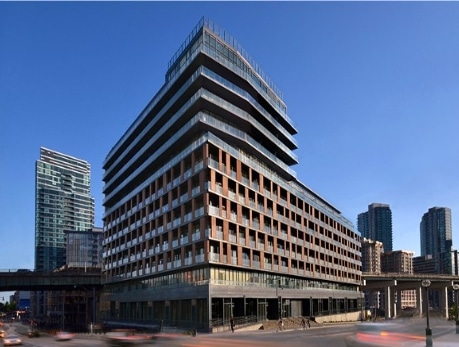Modern condominium building, The Yards, in the Fort York neighbourhood of Toronto, showcasing waterfront views