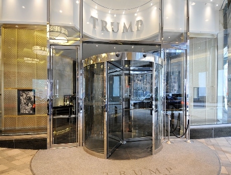 Modern entrance to the Trump condominium building in Toronto’s Financial District, showcasing a revolving glass