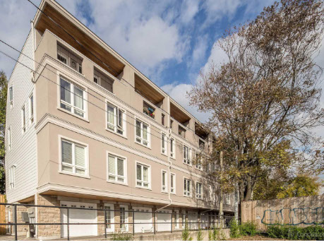 Modern condo building at 501 Logan Ave in Toronto’s East End, showcasing a desirable residence