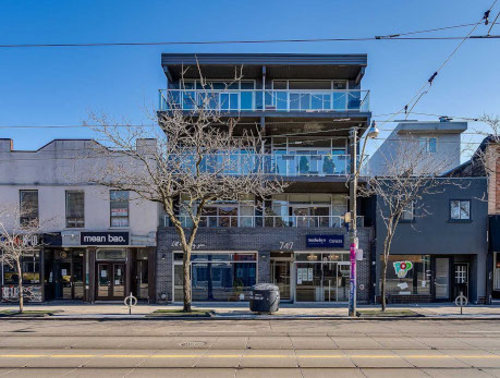 Modern condo building at 747 Queen Street East in Toronto’s vibrant East End, showcasing